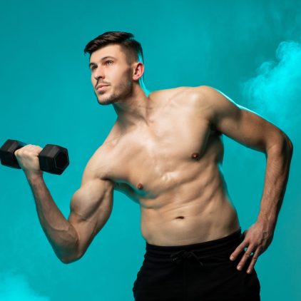 A man with a shirt is shown performing dumbbell exercises on a solid blue background. He is lifting the dumbbells with both hands, focusing on his bicep muscles