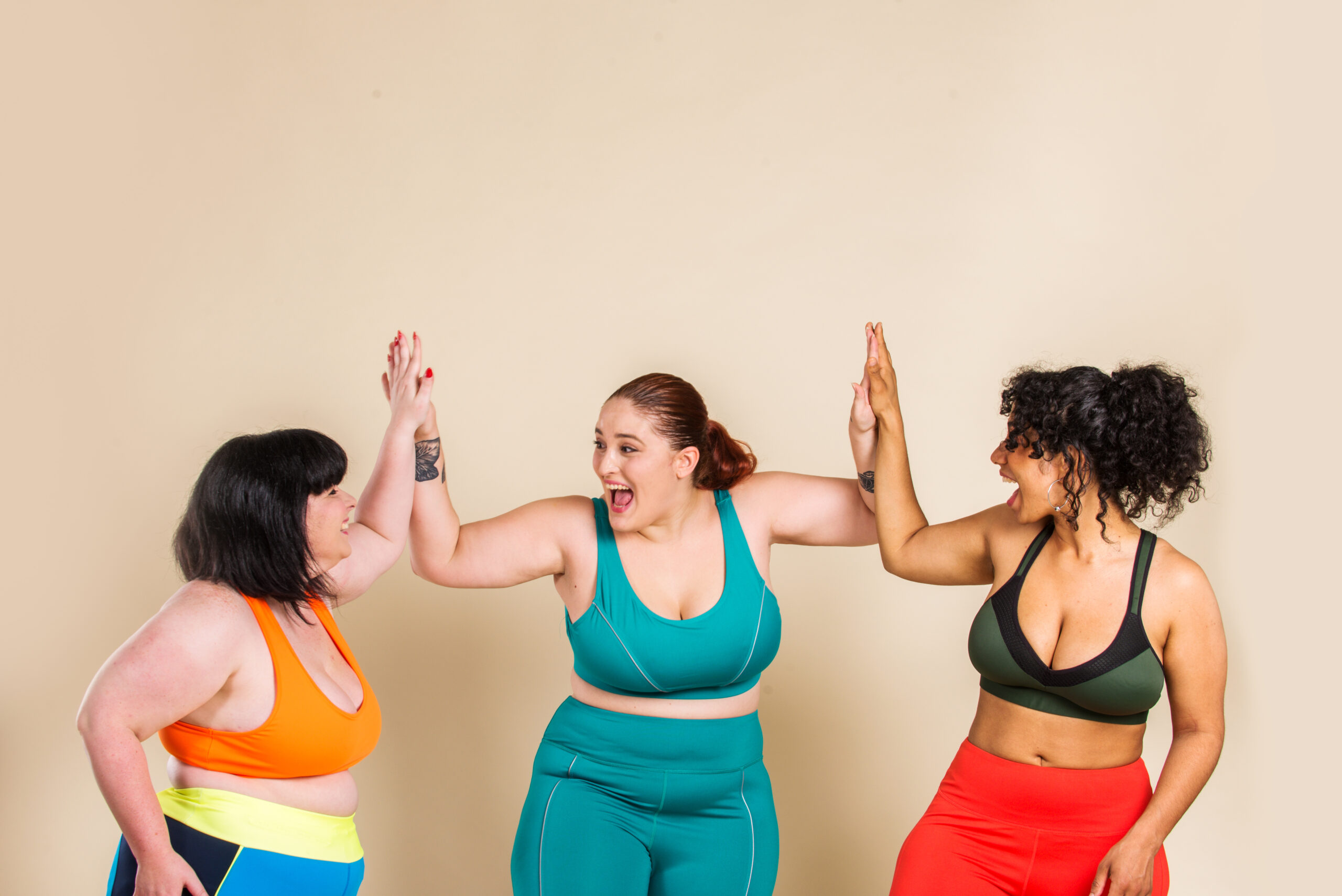 Group of 3 oversize women posing in studio - Beautiful girls accepting body imperfection, beauty shots in studio - Concepts about body acceptance, body positivity and diversity